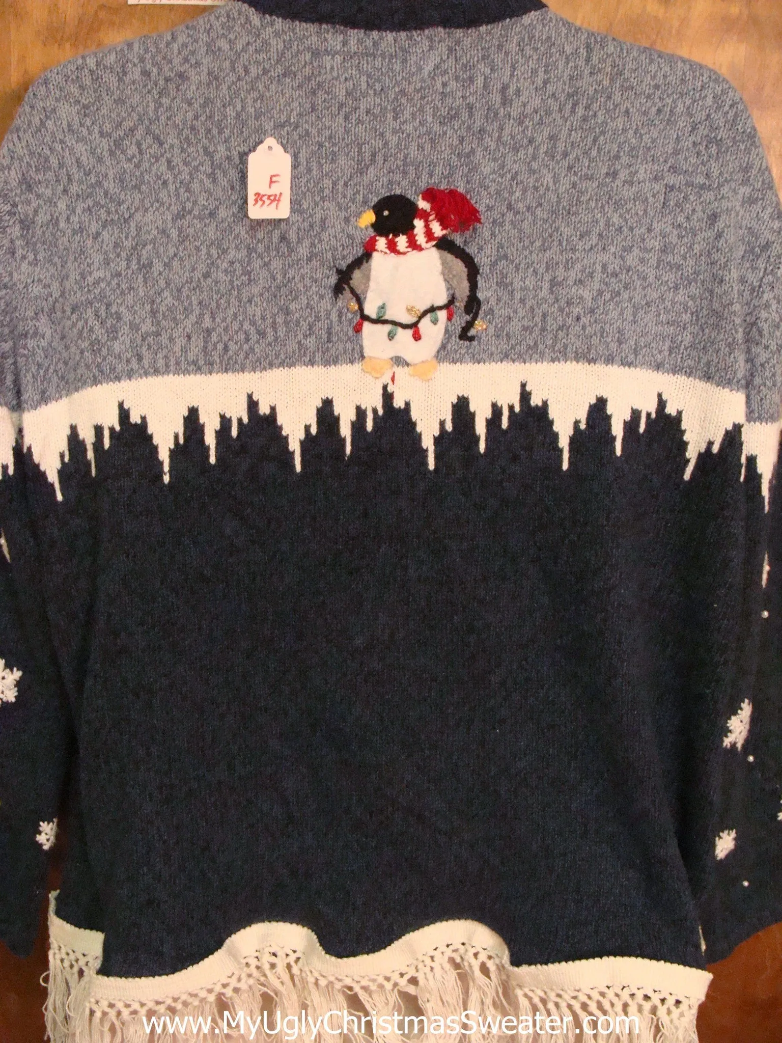 Festive Penguins in Icy Winter Ugly Christmas Sweater